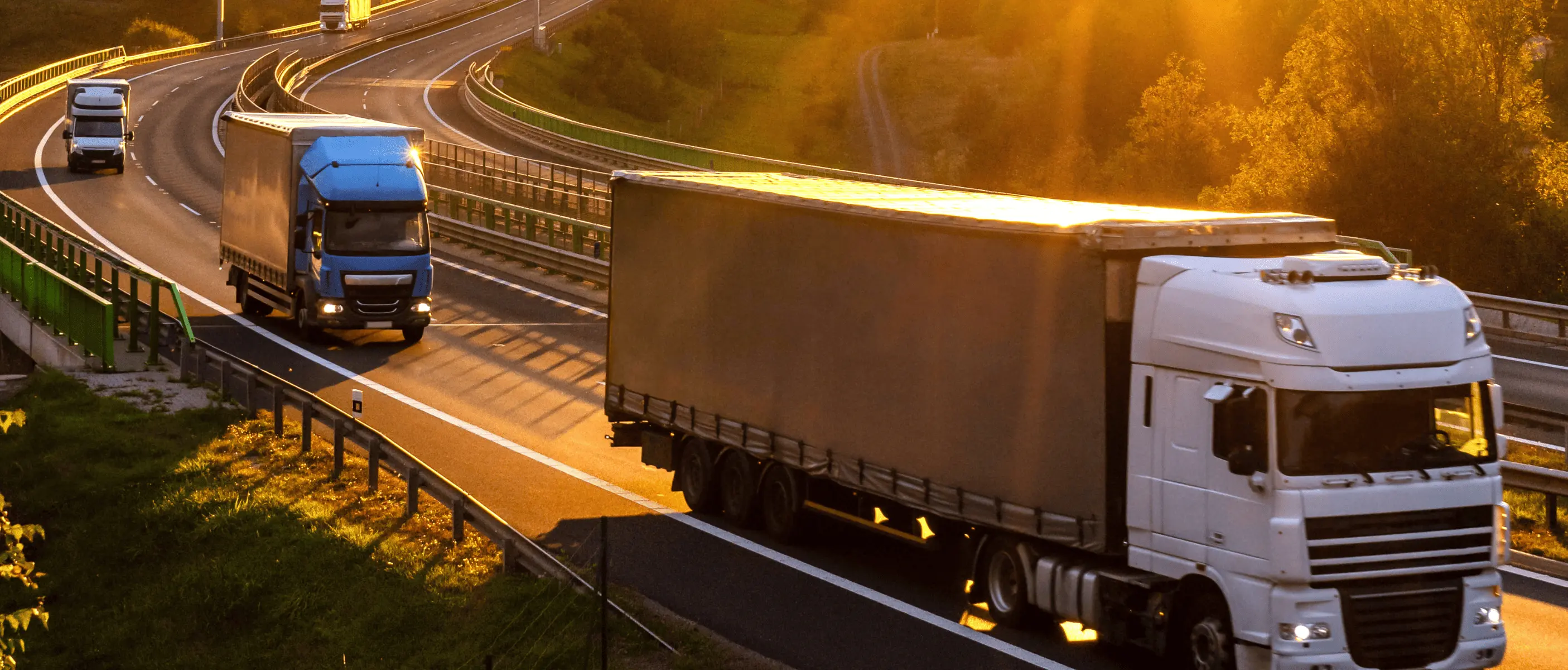 Trucks riding in a highway