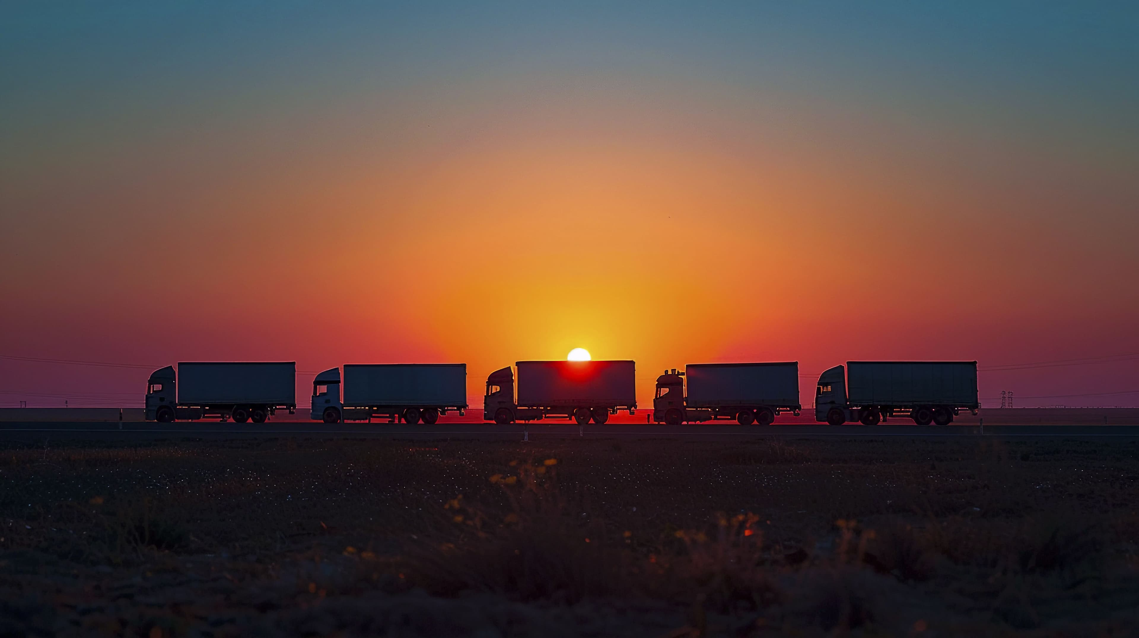 Trucks in the sunset